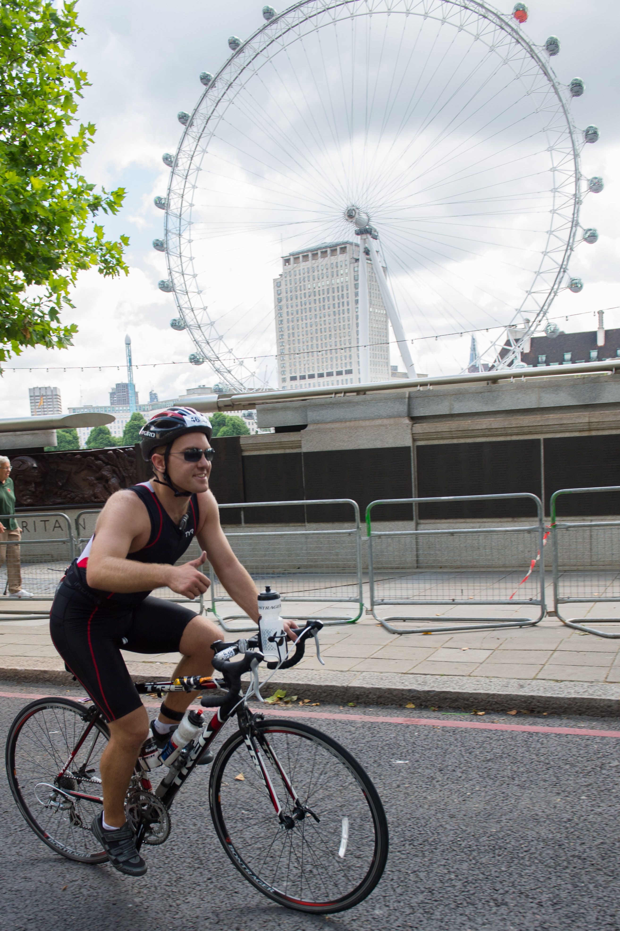 Cycling passing the London Eye