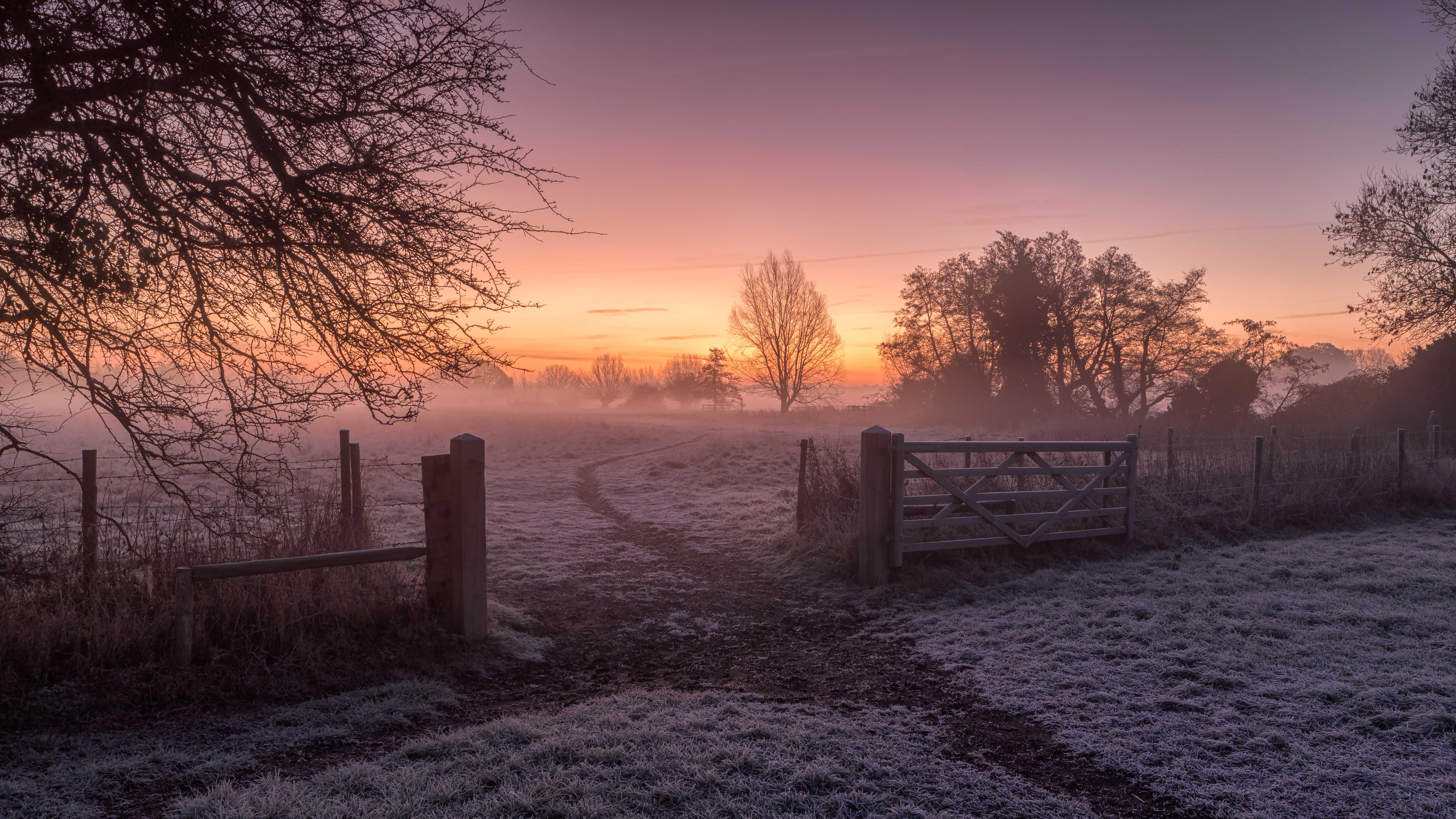 Cold, winter scene in Dedham, Colchester, UK. The frost is still covering the ground but the sun is trying hard to bring warmth to a cold, frosty morning.