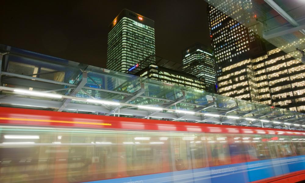 Banking and financial sector buildings are seen from the Docklands Light Railway at Canary Wharf, London, UK.