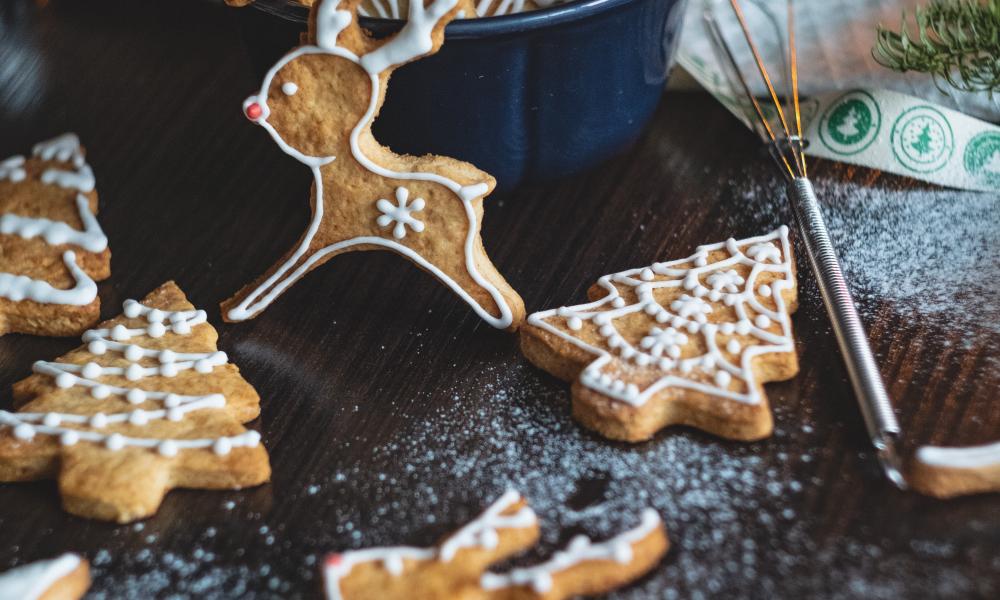 A mixture of Christmas cookies decorated with simple white icing