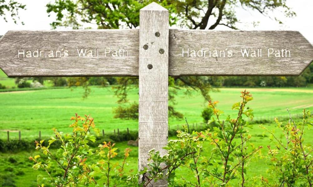 A signpost showing Hadrian's Wall Trail Path