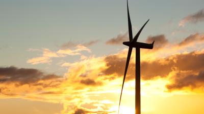 Global warming - Wind farm at sunset