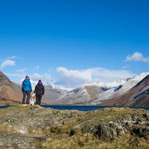 Members of the public enjoying the view on a walk around Wast Water, Lake District, UK