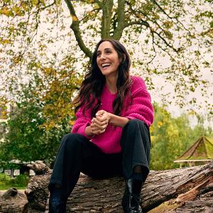 Dr Sara Kayat at Walpole Park in West London sat in a tree stump